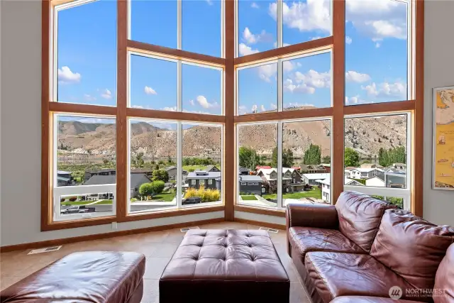 Main floor living room with AMAZING views of the river