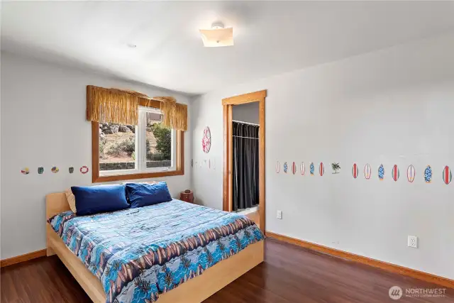 Main floor bedroom with access to bathroom