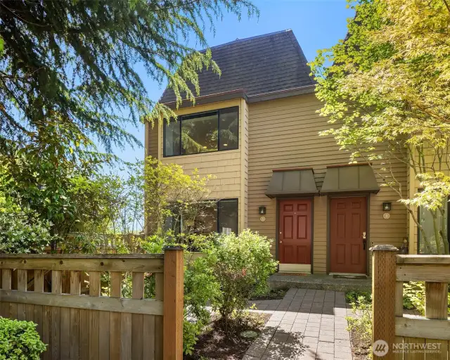End unit townhome boasts a peaceful setting with two outdoor living spaces and easy access to all the downtown amenities.