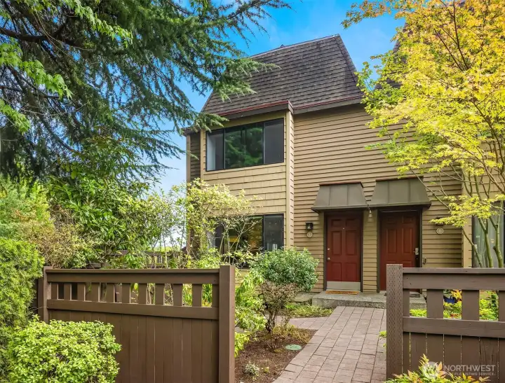 End unit townhome boasts a peaceful setting with two outdoor living spaces and easy access to all the downtown amenities.