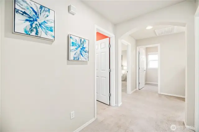 Wide hallways, white painted millwork throughout and plenty of natural light