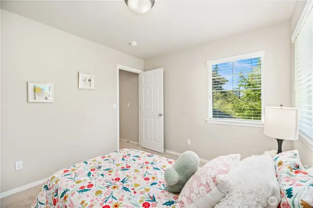 Secondary bedroom with walk in closet