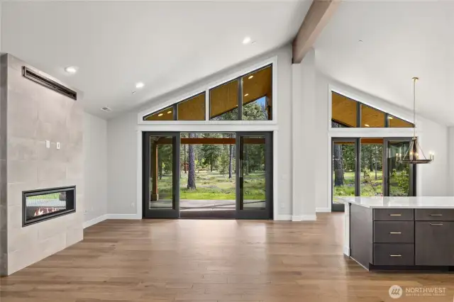 Great room with sliding glass doors to covered patio an additional entertaining space!