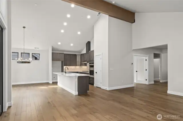 Gourmet kitchen with gas cooktop, stainless steel appliances and micro/oven wall unit.