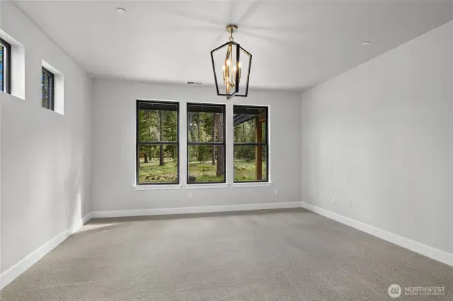 Primary bedroom is located in separate wing.