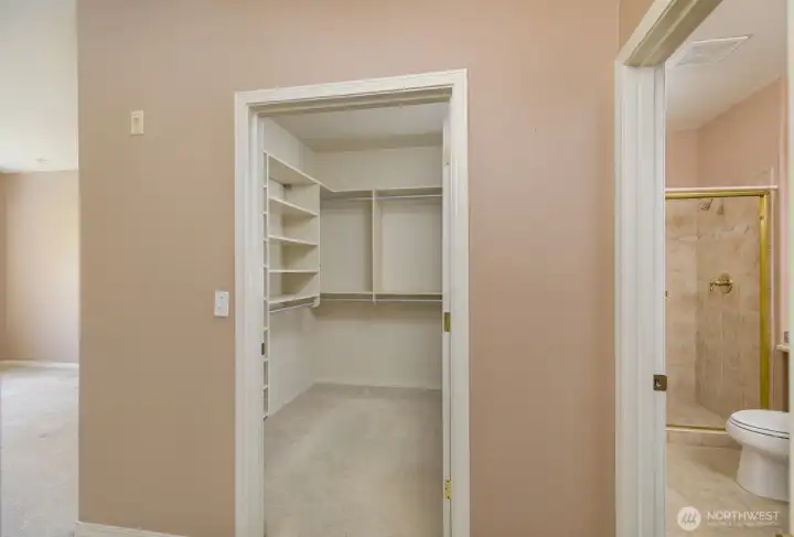 Walk-in closet and bathroom in Primary bedroom