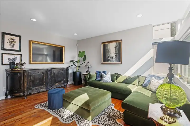 There is a bookcase to the left of this pic.  Behind it are stairs that connect to the lower unit!