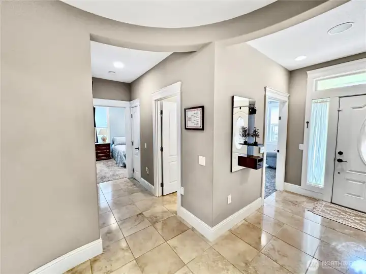 In this photo we see the access to both the 2nd and 3rd bedrooms and powder room.
