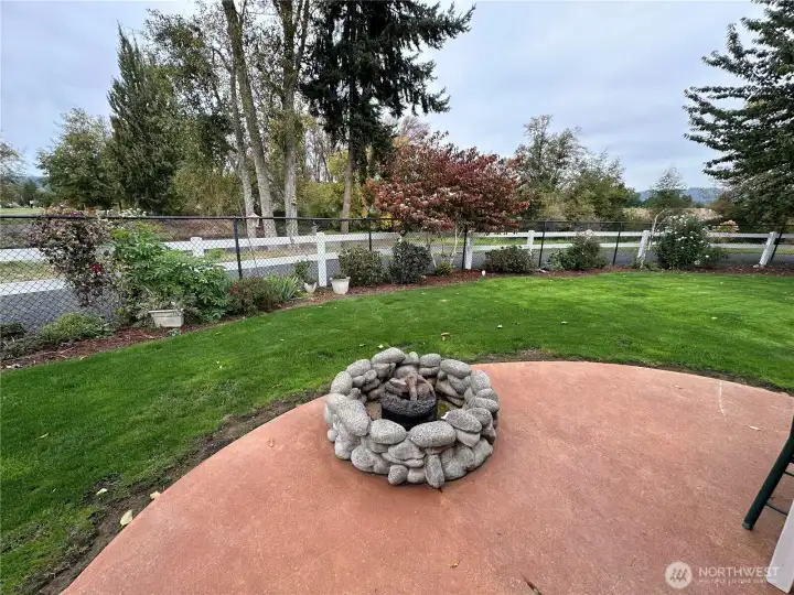 Extended patio with gas fire-pit for outdoor enjoyment.