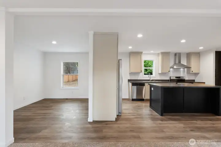 The dining room and kitchen open to the living area.
