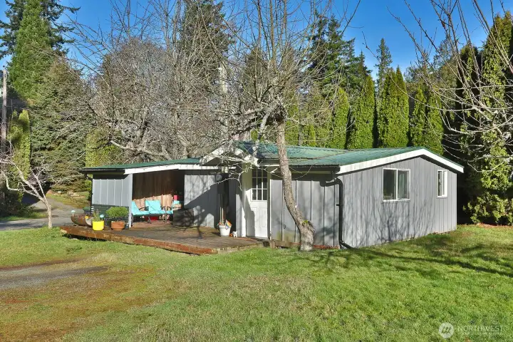 The Guest House has an open living room/kitchen with a full sized kitchen appliances (no dishwasher), full bath, a bedroom and an additional finished room, currently living as a guest room, yet would also make a great office space.