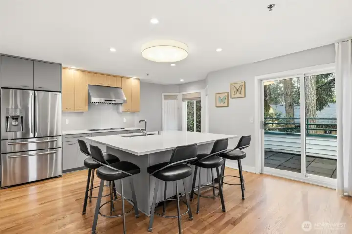 Breakfast nook with integrated sink and bar-style seating.