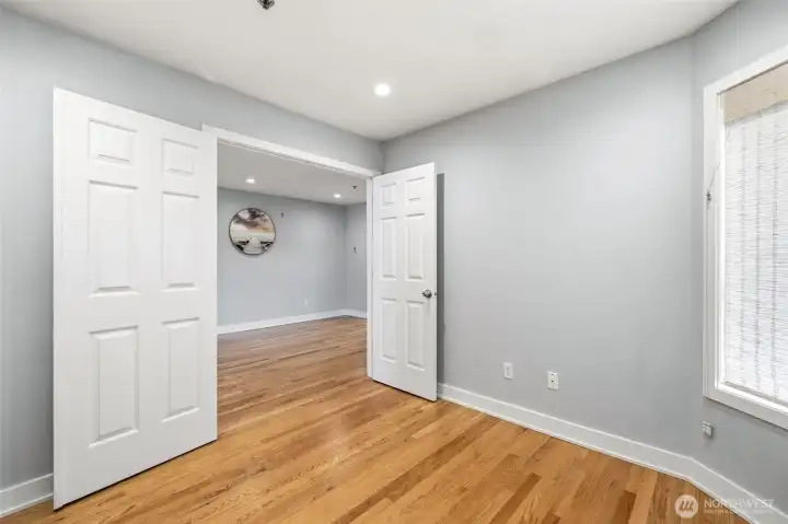 Den/office overlooking the open-concept dining room.