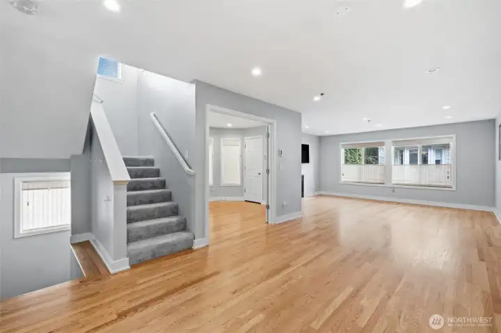 Central staircase connecting to the upper rooms.