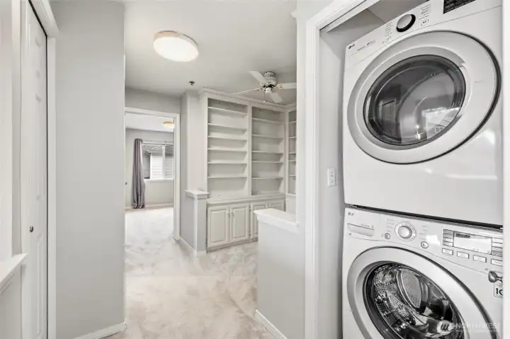 Convenient laundry area with stackable units.