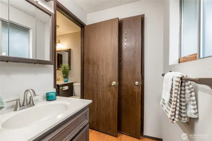 Separate vanity within the primary bedroom