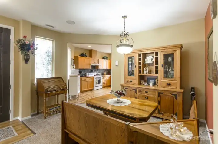 Another view of the dining room in relation to the kitchen area.