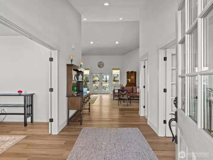 As you enter this gorgeous home, the warmth of the stunning floors and soaring ceilings greet you! As you enter this gorgeous home, the warmth of the stunning floors and soaring ceilings greet you!