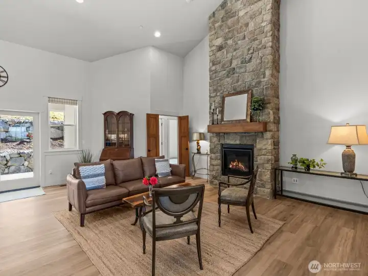 The floor to ceiling fireplace is a showstopper that you'll love gathering near with friends and loved ones. The floor to ceiling fireplace is a showstopper that you'll love gathering near with friends and loved ones.