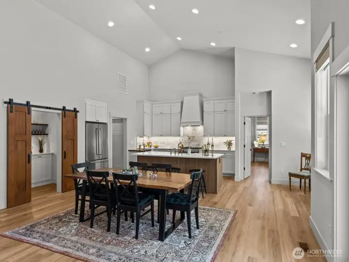 The dining area blends the living room and kitchen seamlessly. The dining area blends the living room and kitchen seamlessly.