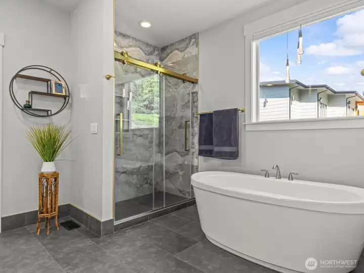 You're never going to want to leave this tub! And the shower is a focal point of its own. You're never going to want to leave this tub! And the shower is a focal point of its own.