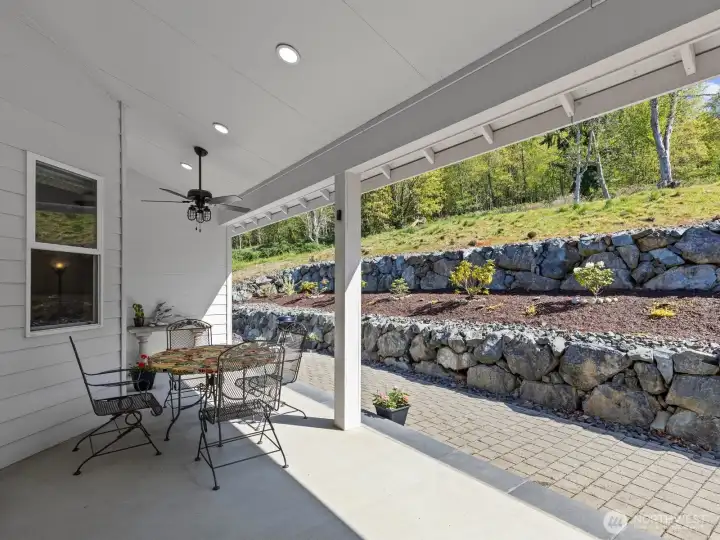 The covered back porch is perfect for enjoying your morning coffee or evening beverage. The covered back porch is perfect for enjoying your morning coffee or evening beverage.