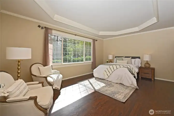 Main floor Primary Suite is expansive.