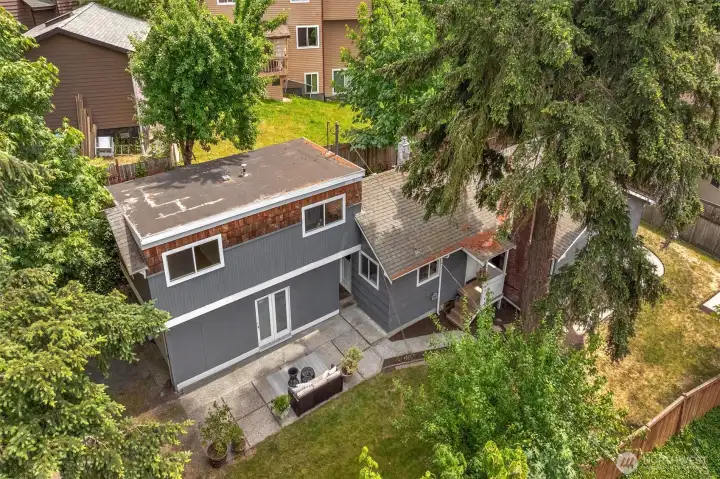 A unique footprint with endless possibilities showcases the distinct multi-level layout, private entryways, and excellent outdoor potential.