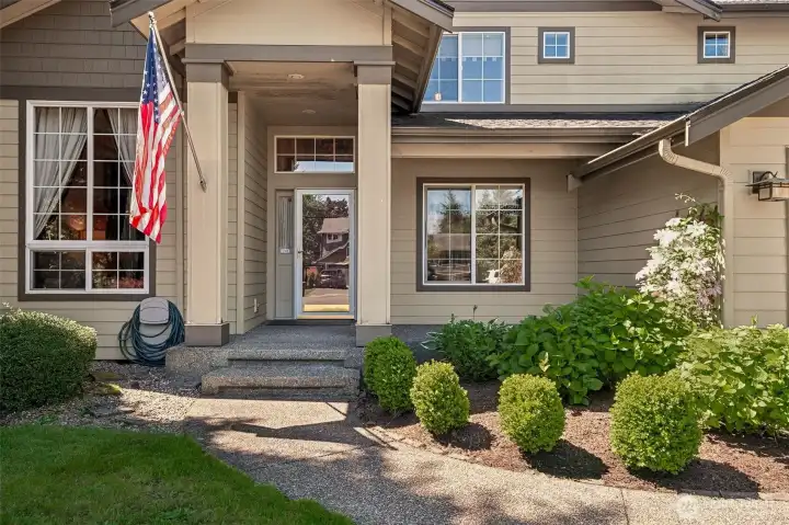 An elegant arched doorway accents the front of your home.