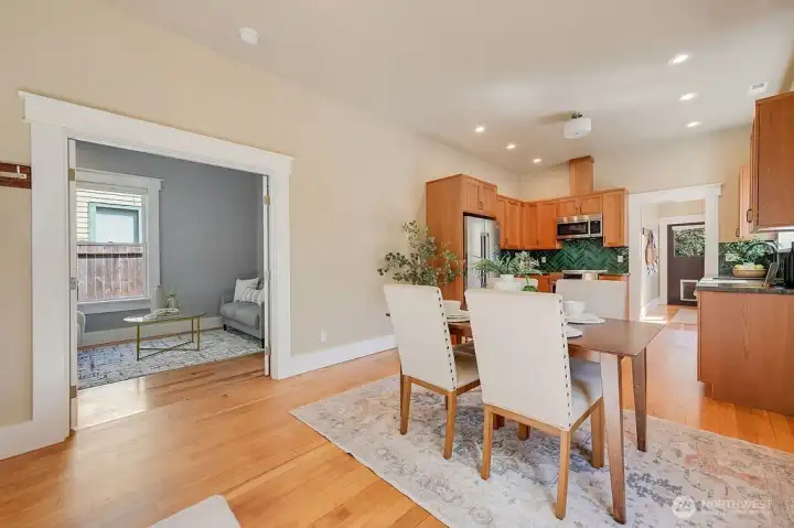 Back into the entry with dining area and kitchen.