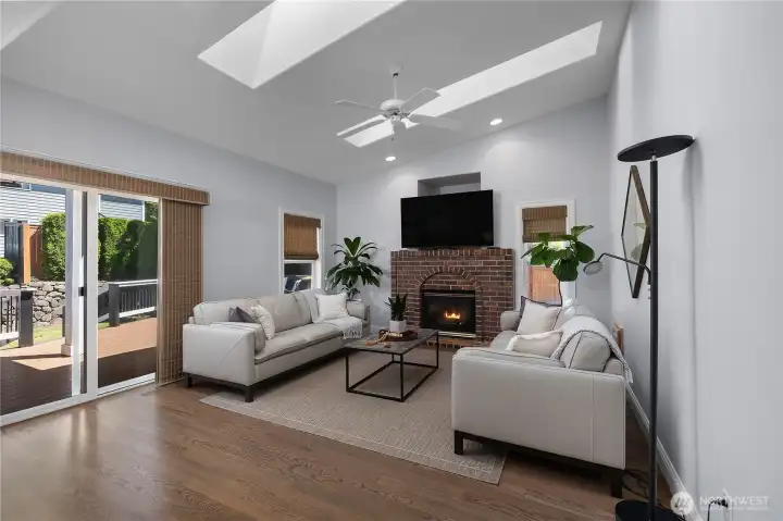 Off of the family room is sliding door access to the backyard and deck Off of the family room is sliding door access to the backyard and deck