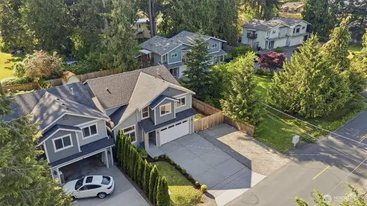 Aerial perspective showing the home tucked beautifully into the neighborhood.