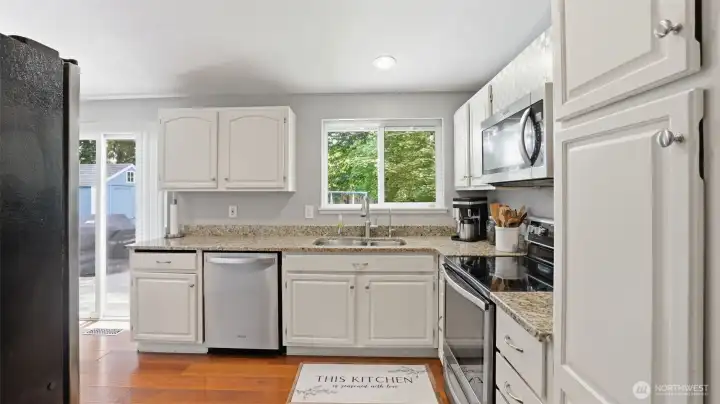 View of your park-like outdoor space from the sink.
