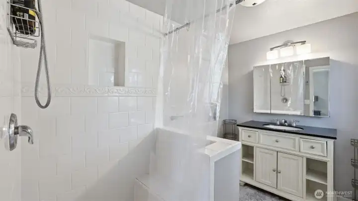 Oversized primary bathroom for this era of home