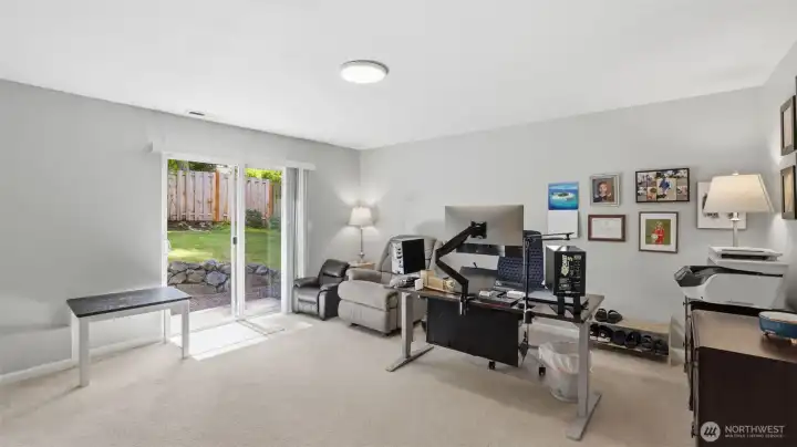 Downstairs rec room or flex space. It makes a great office or TV room