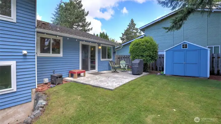 Large patio and storage shed