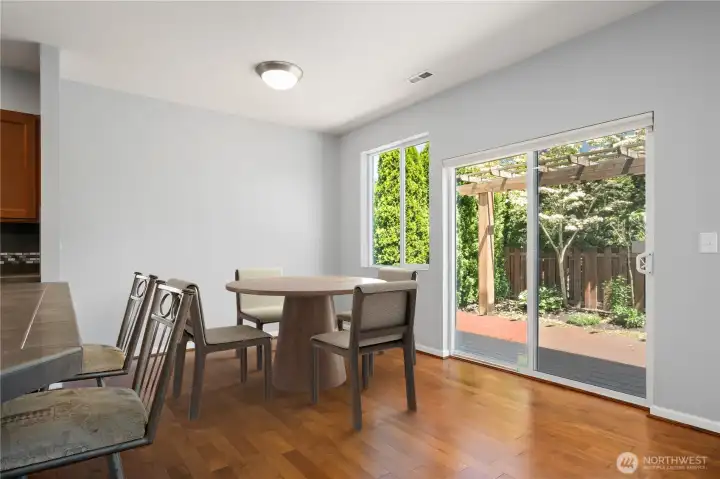 Virtually staged eating area off kitchen
