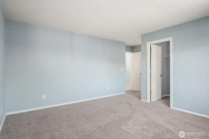 Primary Bedroom with walk-in closet