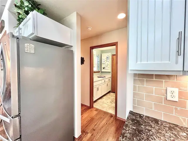 Kitchen Design allows for easy access to Hall and Utility Room