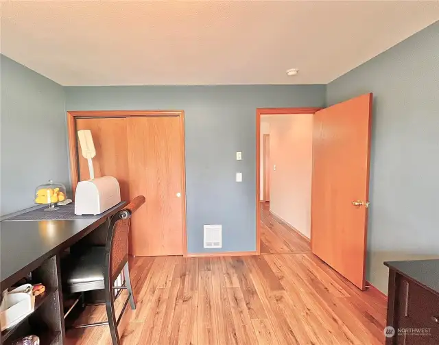 3Rd Bedroom is also a good size room and has a Large Closet and a Slider Door exiting to the Patio. This room also has Waterfront Views and is staged as a home office