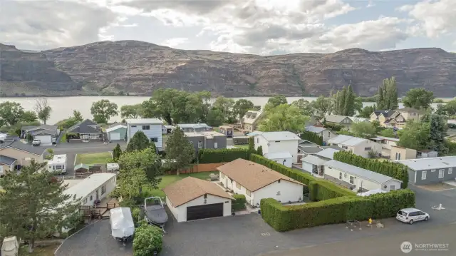 Airiel view of the 2 lots and surrounding homes and the river.