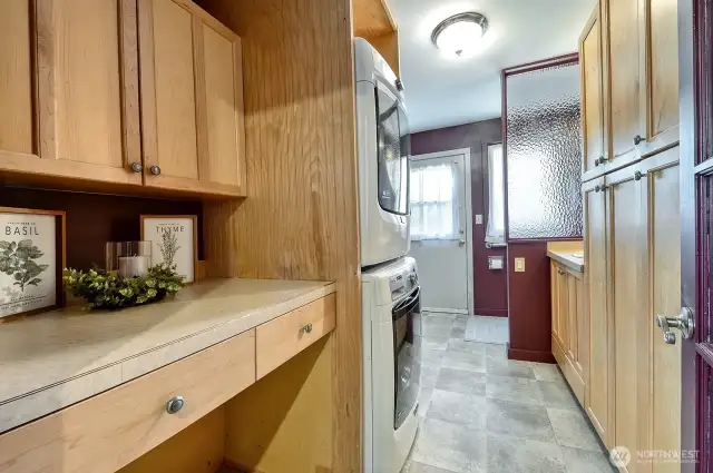 Laundry room and 1/2 bath off the kitchen.  Door leads to fenced backyard.