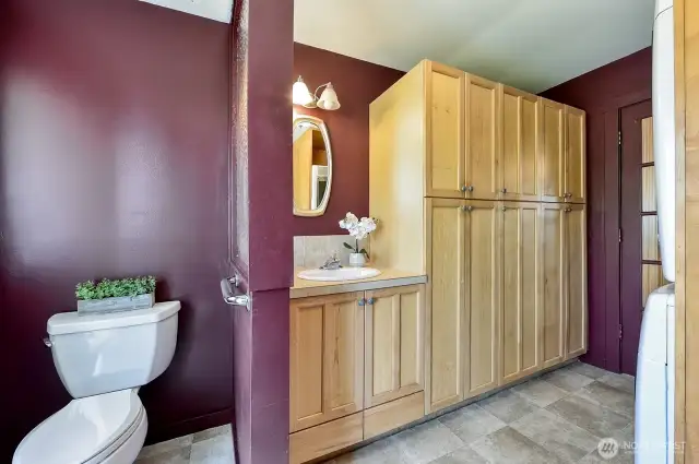 1/2 bath with so much storage!