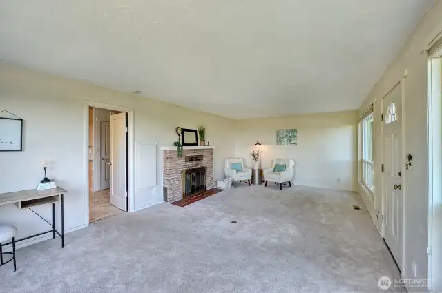 Spacious living room with so much natural light.