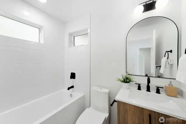 Lower level full bathroom! Model home, colors and finishes may vary.