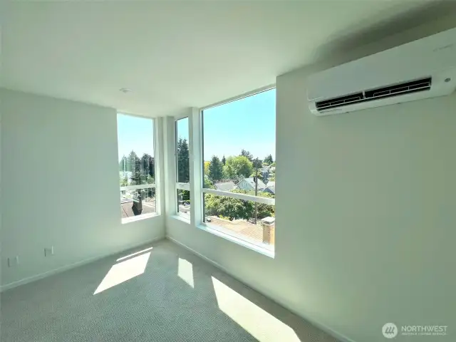 Upper level landing and verdant view.
