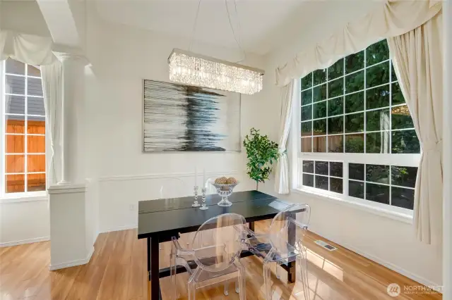 Inviting formal dining room looking out to backyard
