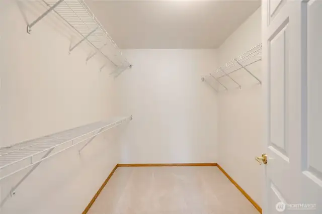 Large walk-in closet in primary suite