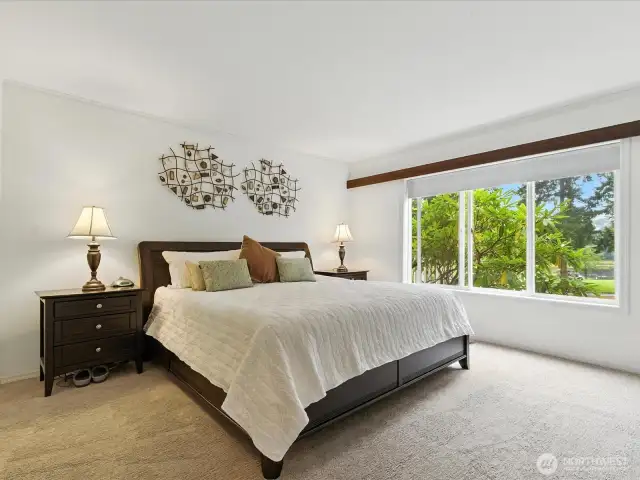 Primary bedroom with french doors. plenty of light and gorgeous views.