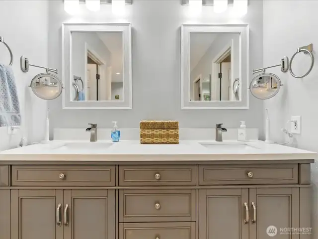 Primary bathroom updated with heated wood plank porclian tile flooring.
